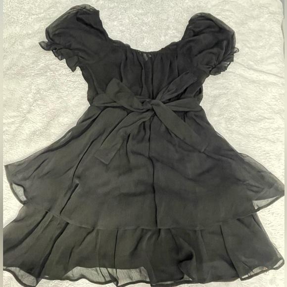 Medium Black Puffy Dress with Tie-Back Detail - Picture 1 of 5